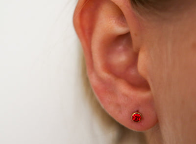 January Garnet Studs